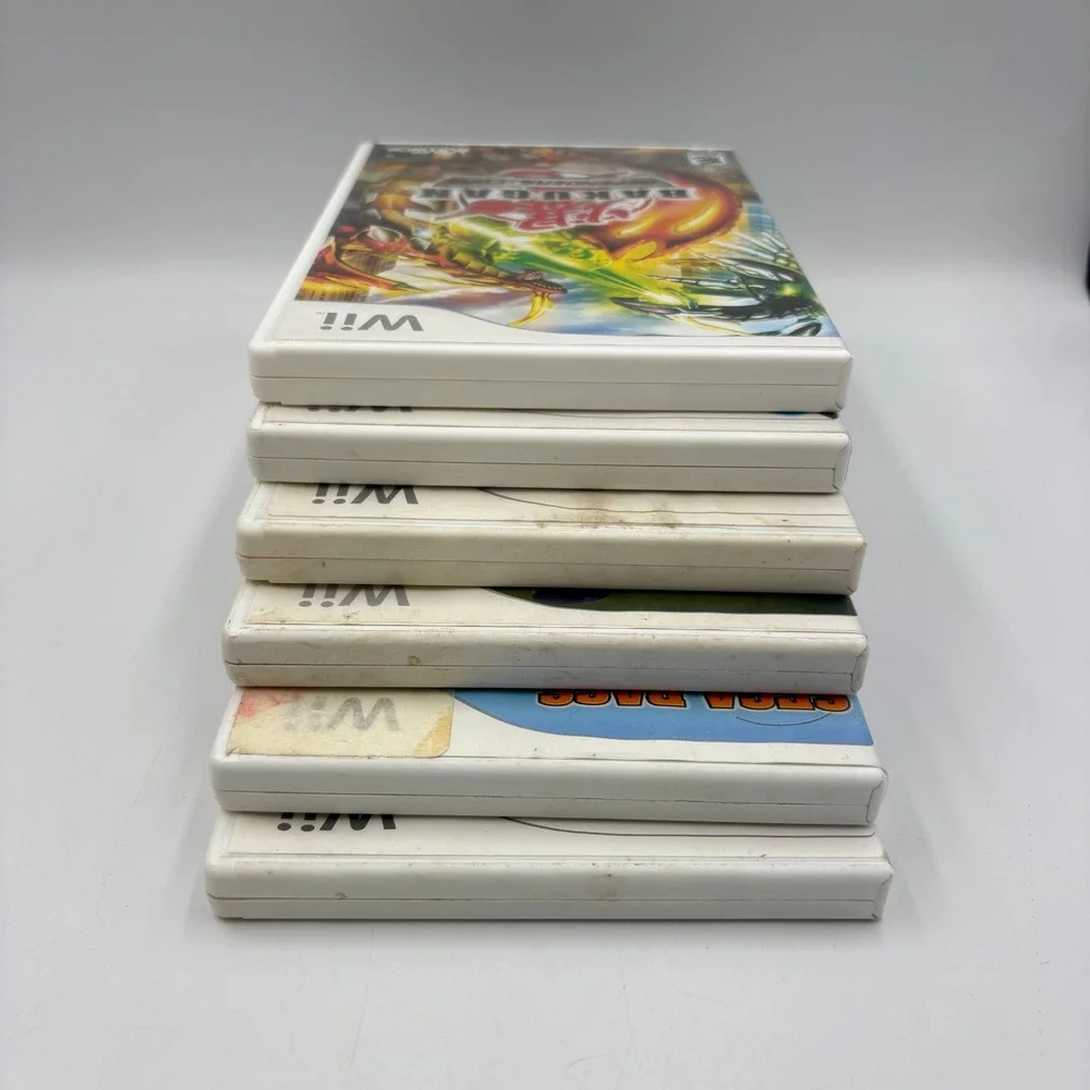 Nintendo Wii Games Bundle 6-Game Lot Various Good Bakugan Transformers Disney
